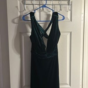 Revelry size 10. Emerald green velvet dress. Cross cross on the back. NEVER WORN